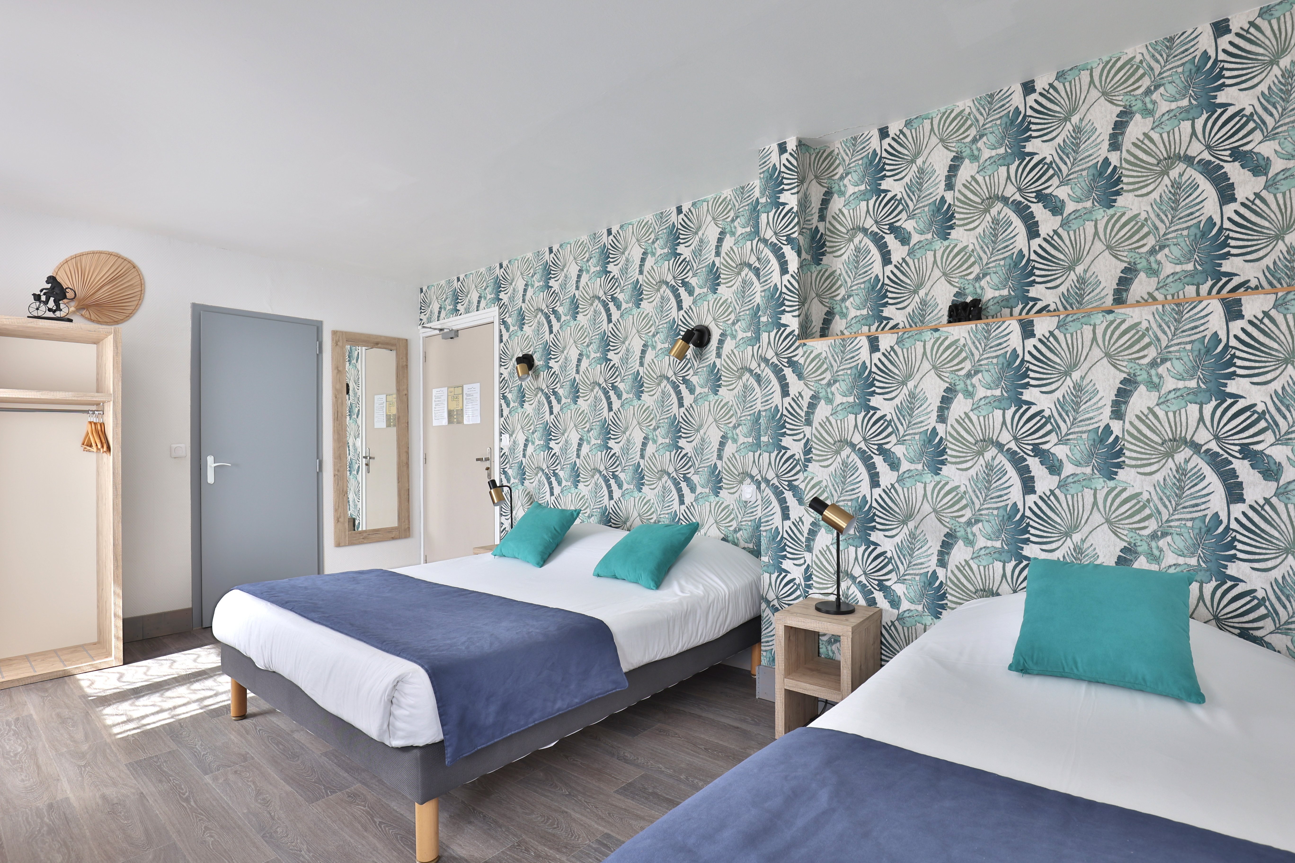 HOTEL DU CAP CAPBRETONhotelducap-chambre-triple-avec-balcon-vue-jardin-2